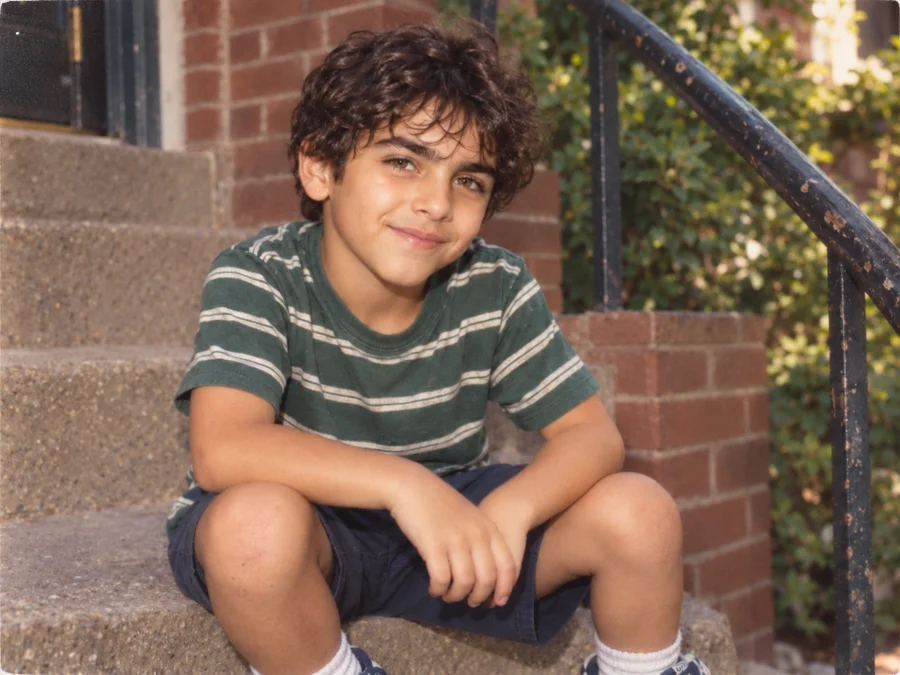 An imagined childhood portrait of Teddy on neighborhood front steps